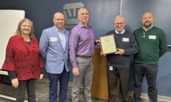 CFO Rob Johnson, Air Force veteran and Waupaca Foundry CFO (middle), accepts the 2024 Vets Ready Silver Award. Also pictured are Wisconsin Department of Workforce Development associates (left to right